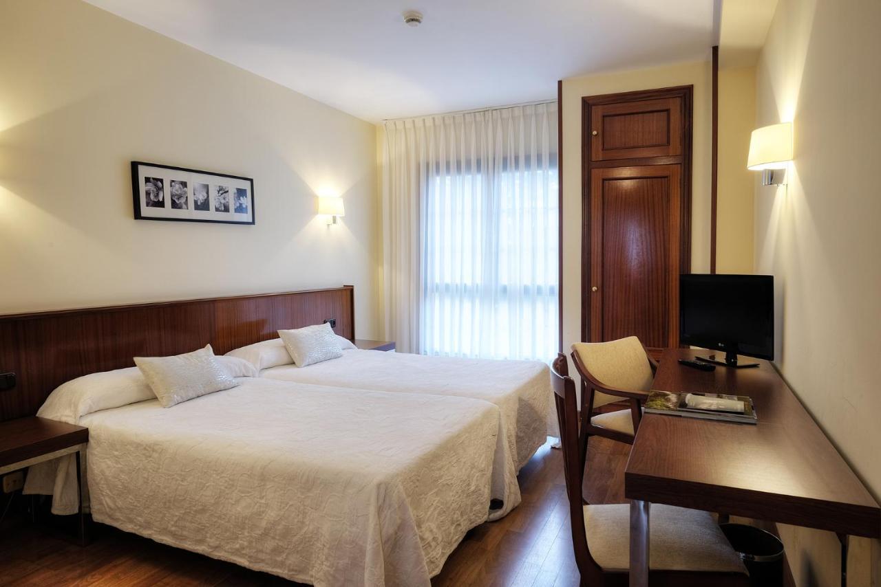 Hotel Y Apartamentos Arias Navia Pokoj fotografie