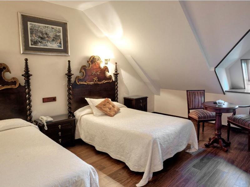 Hotel Y Apartamentos Arias Navia Pokoj fotografie